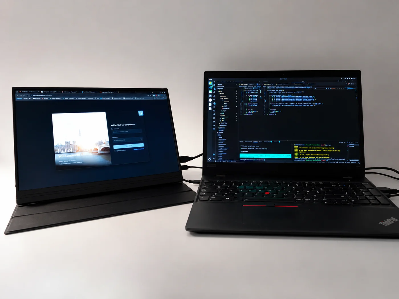Development setup — external monitor with Shopware admin, ThinkPad with VSCode